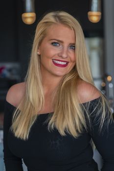 A gorgeous blonde model enjoys a day at home before work