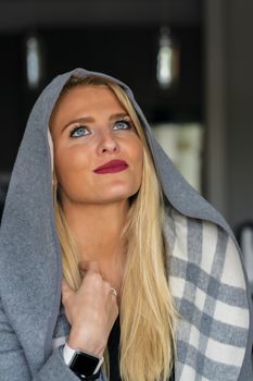 A gorgeous blonde model enjoys a day at home before work