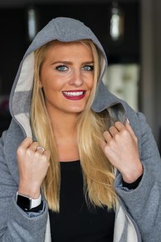 A gorgeous blonde model enjoys a day at home before work