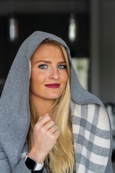 A gorgeous blonde model enjoys a day at home before work
