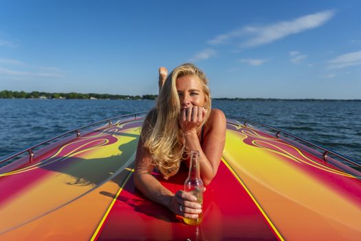 A gorgeous bikini model enjoying a day on the water