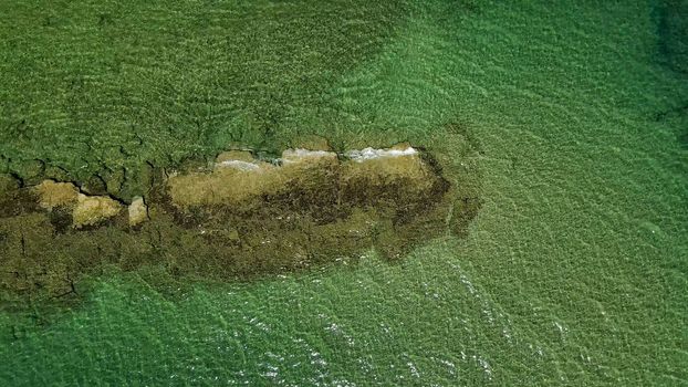 Ancient road in the ocean, old roman ruin. Aerial viewpoint