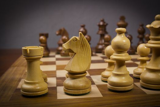 Chess board with beautiful chess wooden pieces