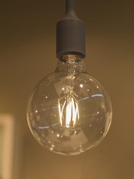close up big retro lighting light bulb on blured background