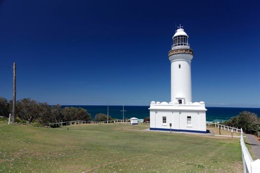 Cape Byron Lighthouse - the easternmost point on the Australian mainland, The lighthouse, which is made of pre-fabricated concrete blocks, was completed in 1901 and stands 18 metres high. High quality photo