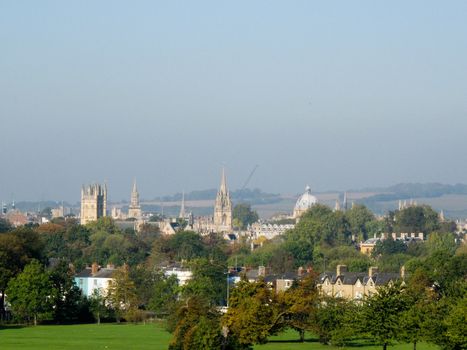 Oxford skyline showing dreaming spires. From South Parks with big blue sky and trees in foregroundHigh quality photo