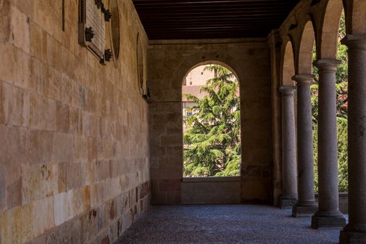 Salamanca, Spain - Old historic cloister in the downtown of Salamanca. Plateresque XV century. The old city of Salamanca was declared a UNESCO World Heritage site in 1988.