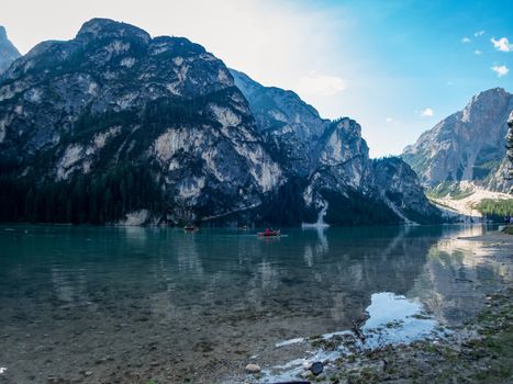 Hiking along the beautiful Braies lake in the Dolomites, South Tyrol