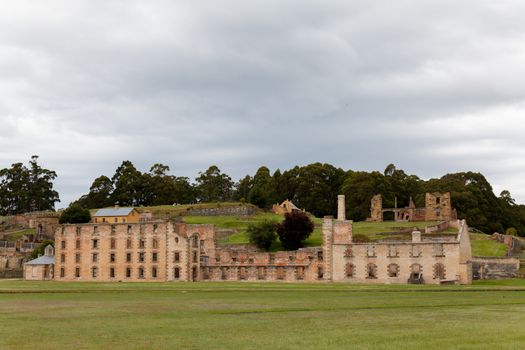 Port Arthur, Tasmania, Australia 25/11/2013 Prison buildings set on the edge of the bay in now lush gardens