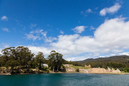 Port Arthur, Tasmania, Australia 25/11/2013 Prison buildings set on the edge of the bay in now lush gardens