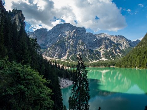 Hiking along the beautiful Braies lake in the Dolomites, South Tyrol