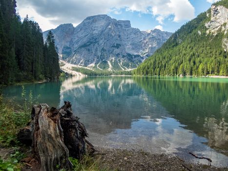 Hiking along the beautiful Braies lake in the Dolomites, South Tyrol