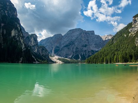 Hiking along the beautiful Braies lake in the Dolomites, South Tyrol