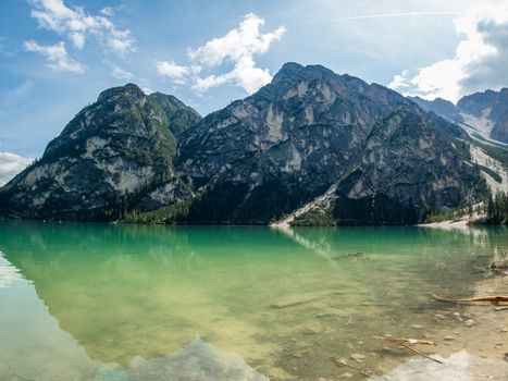 Hiking along the beautiful Braies lake in the Dolomites, South Tyrol