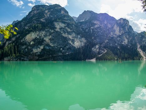 Hiking along the beautiful Braies lake in the Dolomites, South Tyrol