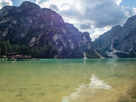 Hiking along the beautiful Braies lake in the Dolomites, South Tyrol