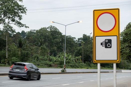Traffic sign displaying, Blank speed limit and speed camera sign.