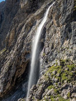 Climbing on the Pisciadu via ferrata of the Sella group in the Dolomites, South Tyrol