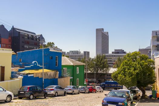 Colorful houses with cityscape of Cape Town. The Bo Kaap district in Cape Town, South Africa.