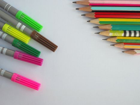 A pencil arranged in a row on a white background