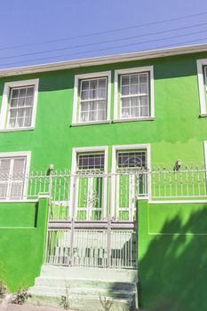 Green house in the Bo-Kaap district in Cape Town, South Africa.