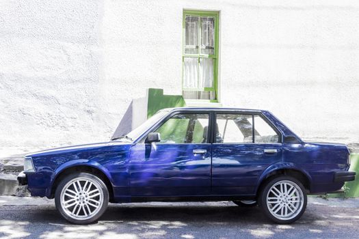 Old nice vintage cars in Cape Town, South Africa. Blue colored cars.