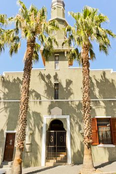 Noble entrance, noble gate of mosque with palms in City of Cape Town, South Africa.