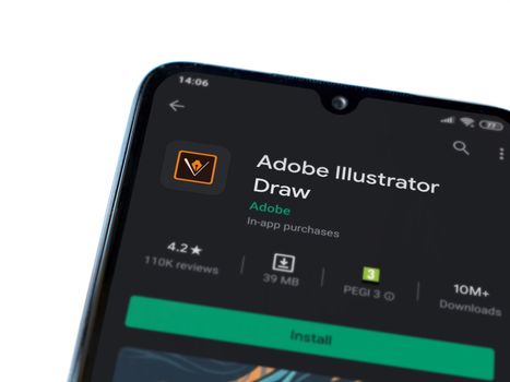 Lod, Israel - July 8, 2020: Adobe Illustrator Draw app play store page on the display of a black mobile smartphone isolated on white background. Top view flat lay with copy space.