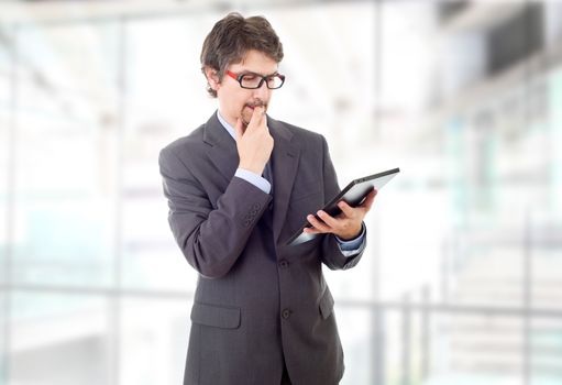 businessman using touch pad of tablet pc, at the office