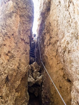 Climbing on the Rotwand and Masare via ferrata in the rose garden in the Dolomites, South Tyrol, Italy