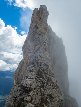 Climbing on the Rotwand and Masare via ferrata in the rose garden in the Dolomites, South Tyrol, Italy