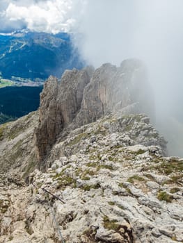 Climbing on the Rotwand and Masare via ferrata in the rose garden in the Dolomites, South Tyrol, Italy