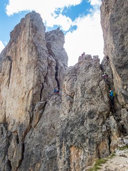 Climbing on the Rotwand and Masare via ferrata in the rose garden in the Dolomites, South Tyrol, Italy