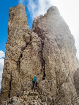 Climbing on the Rotwand and Masare via ferrata in the rose garden in the Dolomites, South Tyrol, Italy