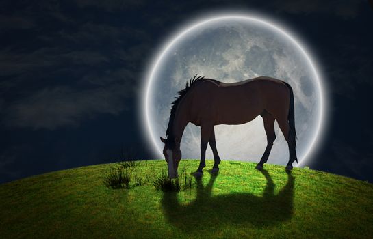 Surrealism. Horse grazes on greem meadow. Giant moon at the horrizon. Some elements image credit NASA.
