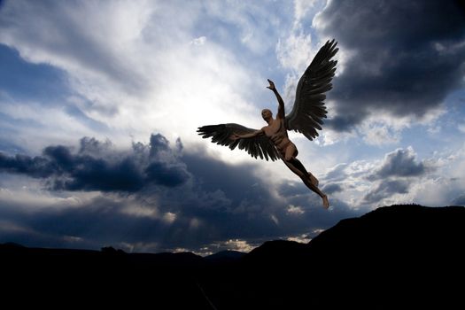Naked man with white wings in cloudy sky symbolizes angel.