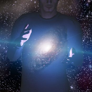 Man holds galaxy between his hands