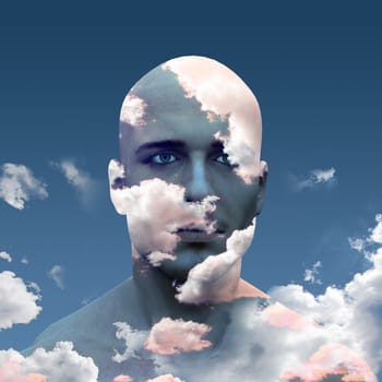 Mans head in clouds