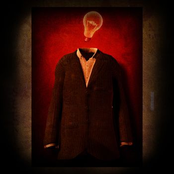 Symbolic composition. Men suit and light bulb