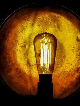 Retro style decorative light bulbs with golden background