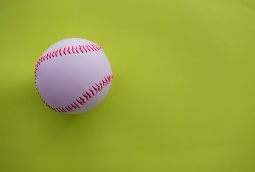 Baseball shot from directly above against green background