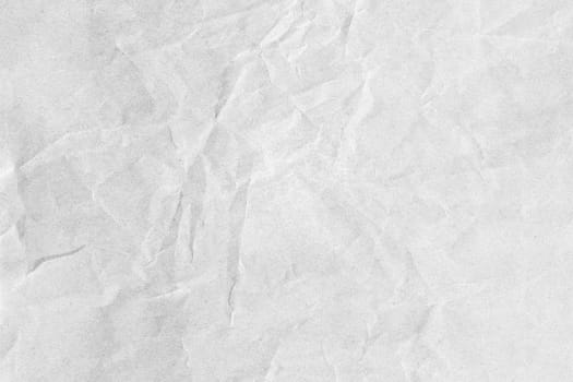 Grey crumpled background paper texture