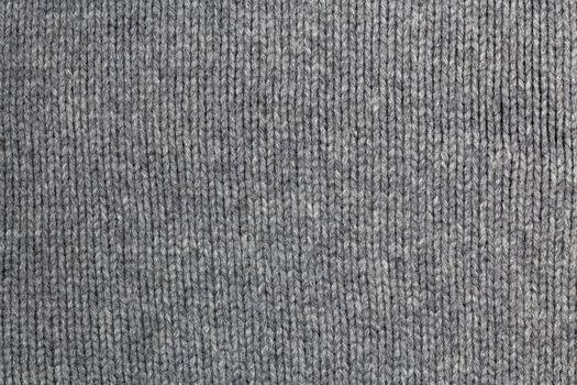 old gray warm wool sweater texture and background.