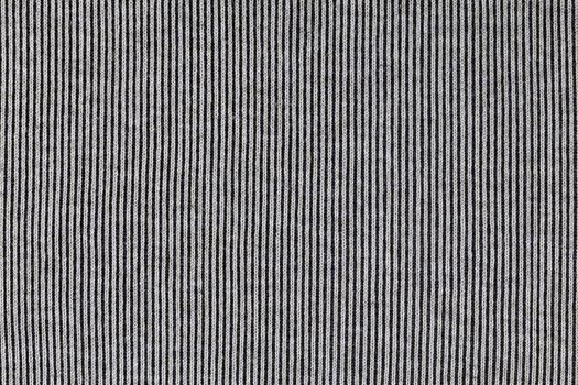 abstract vertical stripped texture of flat fabric surface.