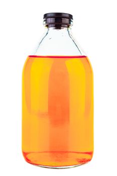 old style glass medical or chemical bottle with yellow transparent liquid isolated on white background, closed with black rubber cap