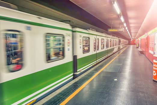 MILAN, ITALY - SEPTEMBER 2015: Interior of city subway with fast moving train.