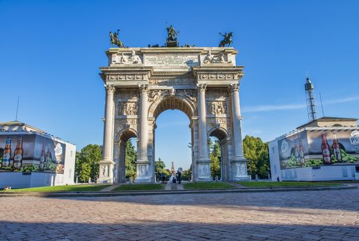 MILANO, ITALY - SEPTEMBER 2015: Tourists visit Arco della pace in the gardens of Parco Sempione.