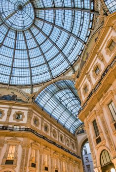 MILANO, ITALY - SEPTEMBER 2015: Galleria Vittorio Emanuele II in Milano. It's one of the world's oldest shopping malls, designed and built by Giuseppe Mengoni.