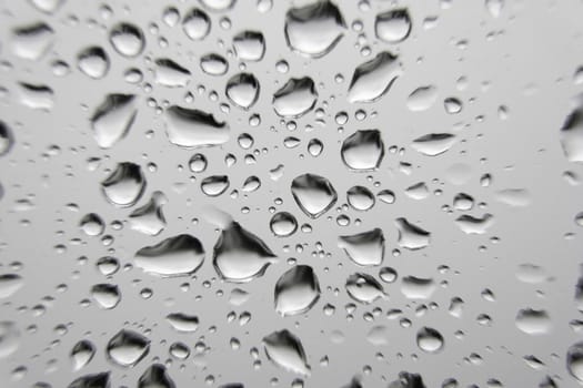 Drops of rain on the window, shallow dof