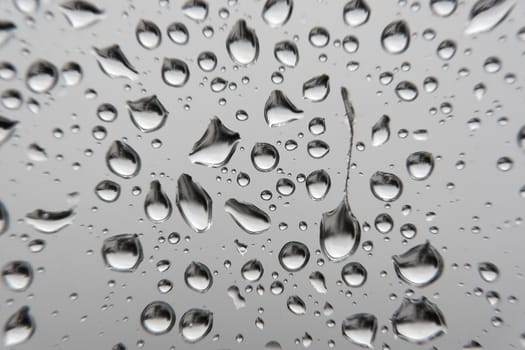 Drops of rain on the window, shallow dof